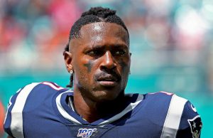 New England Patriots wide receiver Antonio Brown looks on before the start of a game against the Miami Dolphins at Hard Rock Stadium in Miami Gardens, Fla., on September 15 2019. 