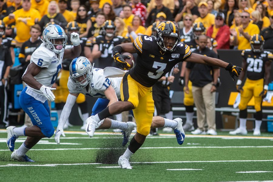 Iowa wide receiver Tyrone Tracy Jr. breaks a tackle during a football game between Iowa and Middle Tennessee State University on Saturday, September 28, 2019. The Hawkeyes defeated the Blue Raiders 48-3.