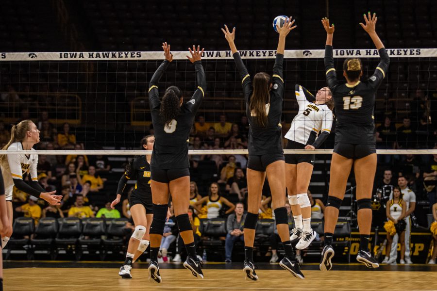 Iowa outside hitter Meghan Buzzerio goes for a kill during a volleyball match between Iowa and Colorado in Carver-Hawkeye Arena on Friday, September 6, 2019. The Hawkeyes dropped their season opener to the Buffaloes, 3-0.