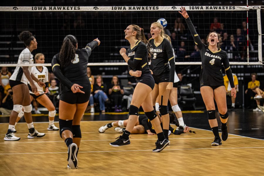 Colorado players celebrate a point during a volleyball match between Iowa and Colorado in Carver-Hawkeye Arena on Friday, September 6, 2019. The Hawkeyes dropped their season opener to the Buffaloes, 3-0.