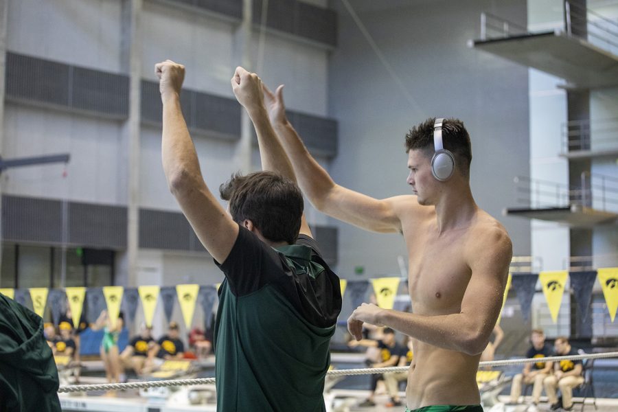 Michigan+State+coach+and+swimmer+cheer+on+teammates+at+the+swim+meet+on+Friday%2C+October+4.+The+Iowa+men+won+over+Michigan+State%2C+180+to+112.+The+Iowa+women+won+over+Michigan+State+183+to+113.+The+women+also+won+over+Northern+Iowa.+183+to+113.+Michigan+State+won+over+Northern+Iowa+180+to+120.++
