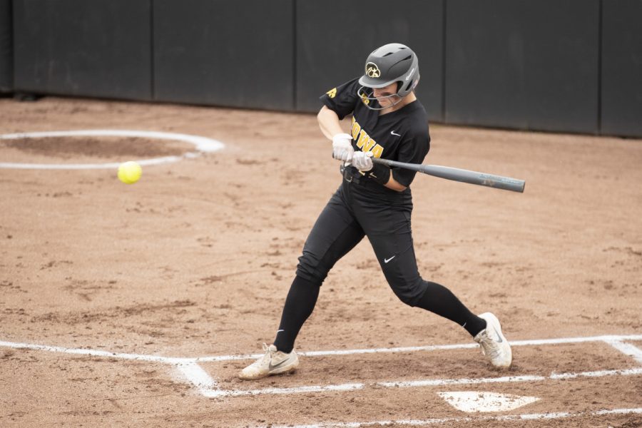 Iowa utility player Ashley Hamilton swings at the Iowa softball game against Indian Hills at Pearl Field on Sunday, October 6th, 2019. The Hawkeyes defeated the Warriors 21-2.