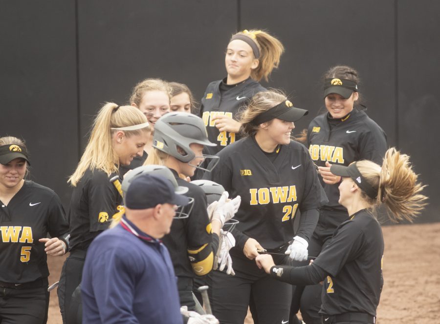 Iowa softball team cheers after a home run at the Iowa softball game against Indian Hills at Pearl Field on Sunday, October 6th, 2019. The Hawkeyes defeated the Warriors 21-2. 