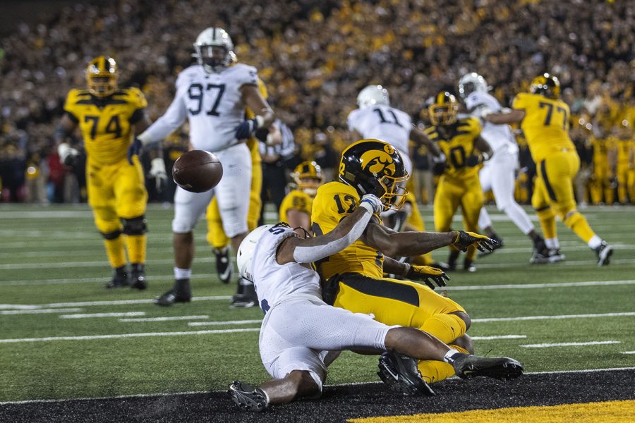 Iowa’s WR Brandon Smith is tackled and doesn’t catch a pass during the Iowa football vs. Penn State game in Kinnick Stadium on Saturday, Oct. 12, 2019. The Nittany Lions defeated the Hawkeyes 17-12. 