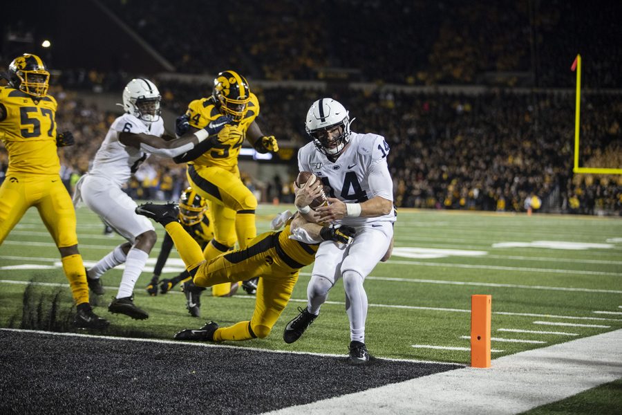 Penn State’s Sean Clifford scores a touchdown during the Iowa football vs. Penn State game in Kinnick Stadium on Saturday, Oct. 12, 2019. The Nittany Lions defeated the Hawkeyes 17-12. 