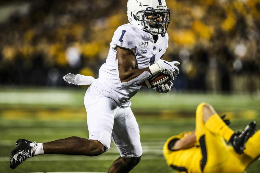 Penn State wide receiver KJ Hamler carries the ball during the Iowa football game against Penn State in Iowa City on Saturday, Oct. 12, 2019. The Nittany Lions lead the Hawkeyes 7-6 at half.
