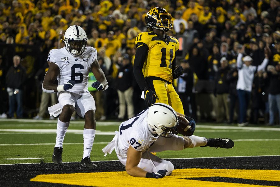 Penn State tight end Pat Freiermuth lands in the end zone, leading to the touchdown being revoked, during the Iowa football game against Penn State in Iowa City on Saturday, Oct. 12, 2019. The Nittany Lions defeated the Hawkeyes 17-12.