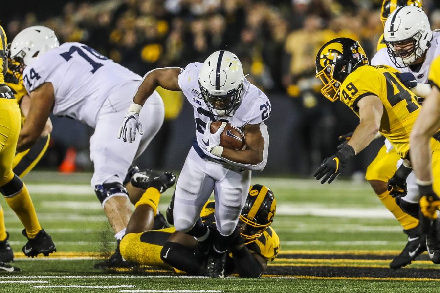 Penn State running back Noah Cain carries the ball during the Iowa football game against Penn State in Iowa City on Saturday, Oct. 12, 2019. The Nittany Lions defeated the Hawkeyes 17-12.