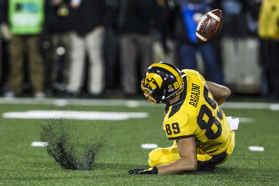 Iowa wide receiver Nico Ragaini loses the ball on a kick during the Iowa football game against Penn State in Iowa City on Saturday, Oct. 12, 2019. The Nittany Lions defeated the Hawkeyes 17-12.