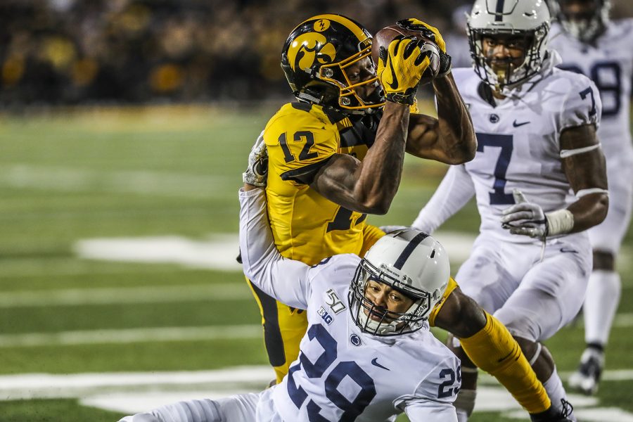 Iowa wide receiver Brandon Smith catches a touchdown pass during the Iowa football game against Penn State in Iowa City on Saturday, Oct. 12, 2019. The Nittany Lions defeated the Hawkeyes 17-12.