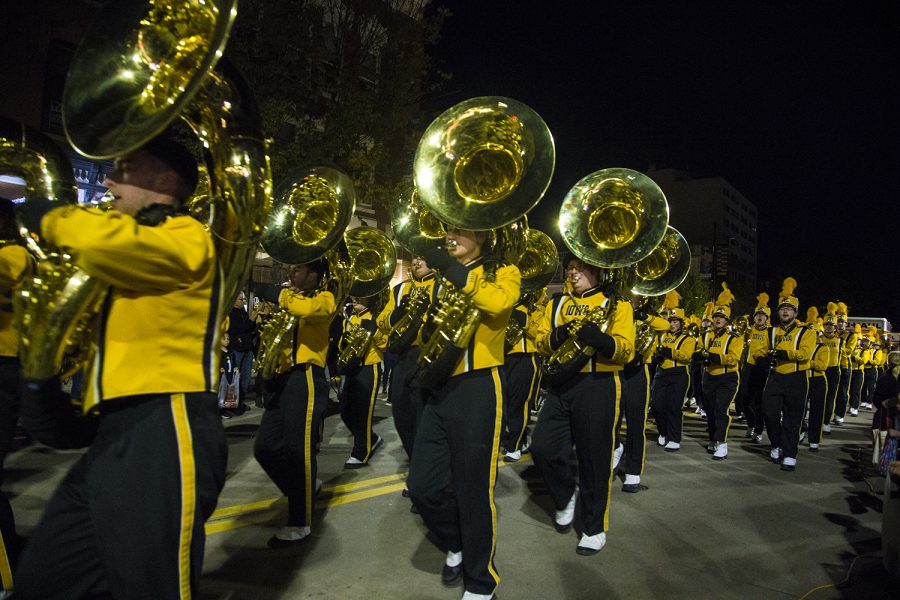 The University of Iowa Marching Band performs during the 2019 Homecoming Parade on Oct. 18 in Downtown Iowa City.