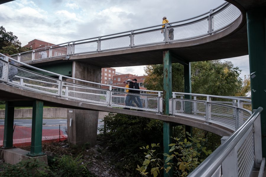 Fans cross the Riverside Drive bridge before the football game on Saturday, October 19, 2019. Iowa is ranked 23rd in the AP College Football Rankings. 