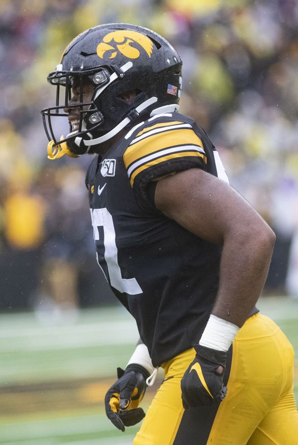 Iowa linebacker Dijimon Colbert celebrates after tipping a pass thrown by Purdue quarterback Jack Plummer during the Iowa football game against Purdue at Kinnick Stadium on Saturday, Oct. 19, 2019. The Hawkeyes defeated the Boilermakers 26-20. 