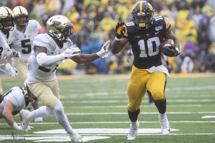 Iowa running back Mekhi Sargent runs downfield during the Iowa football game against Purdue at Kinnick Stadium on Saturday, Oct. 19, 2019. Sargent scored a touchdown for the Hawkeyes during the fourth quarter. The Hawkeyes defeated the Boilermakers 26-20.