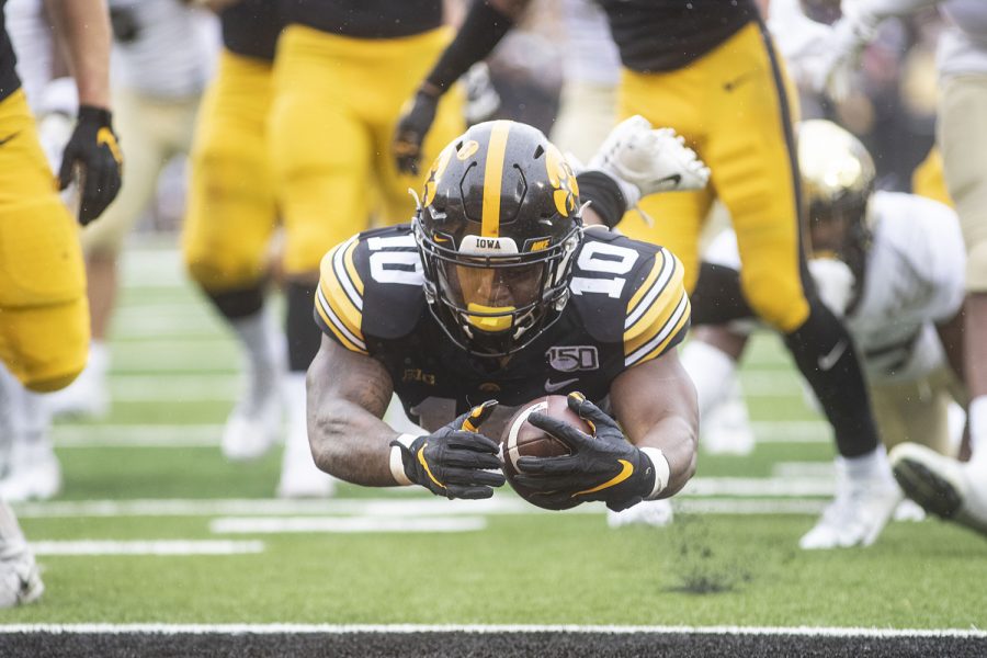 Iowa running back Mekhi Sargent scores a touchdown during the Iowa football game against Purdue at Kinnick Stadium on Saturday, Oct. 19, 2019. The Hawkeyes defeated the Boilermakers 26-20.