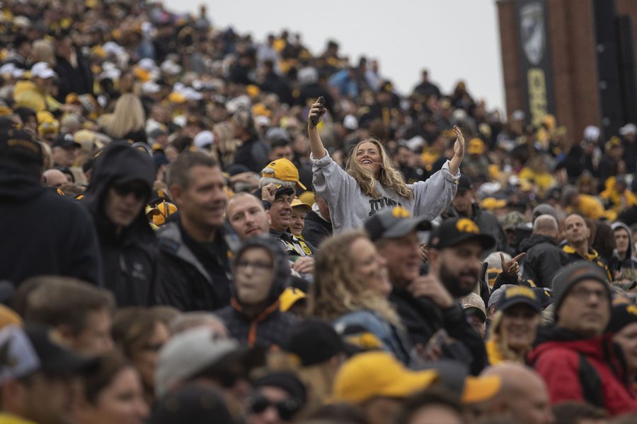 An Iowa fan dances in the stands during the Iowa football game against Purdue at Kinnick Stadium on Saturday, Oct. 19, 2019. The Hawkeyes defeated the Boilermakers 26-20. 