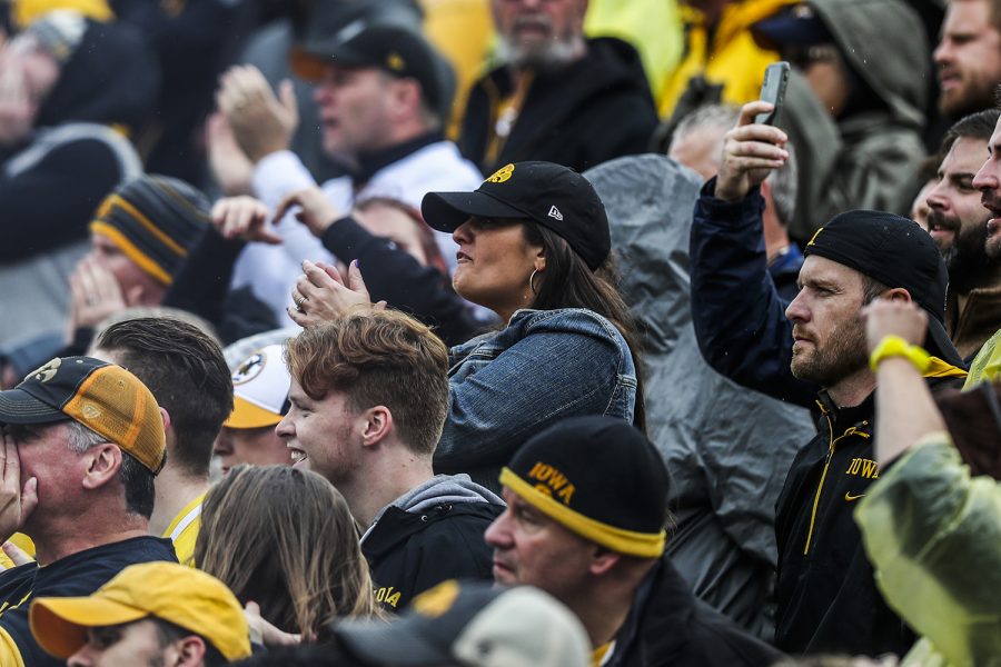 Fans react during the Iowa football game against Purdue at Kinnick Stadium on Saturday, Oct. 19, 2019. The Hawkeyes defeated the Boilermakers 26-20.