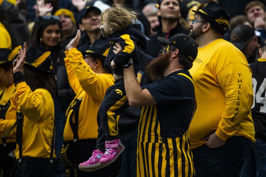 Iowa fans celebrate during the Iowa football game against Purdue at Kinnick Stadium on Saturday, Oct. 19, 2019. The Hawkeyes defeated the Boilermakers 26-20.