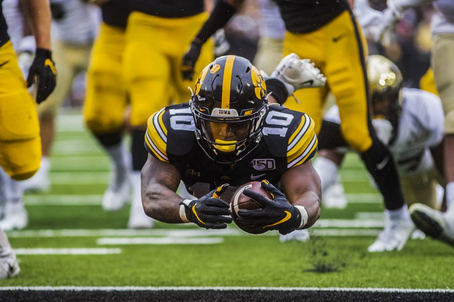 Iowa running back Mekhi Sargent scores a touchdown during the Iowa football game against Purdue at Kinnick Stadium on Saturday, Oct. 19, 2019. The Hawkeyes defeated the Boilermakers 26-20. Sargent led the team with 13 carries over 68 yards.