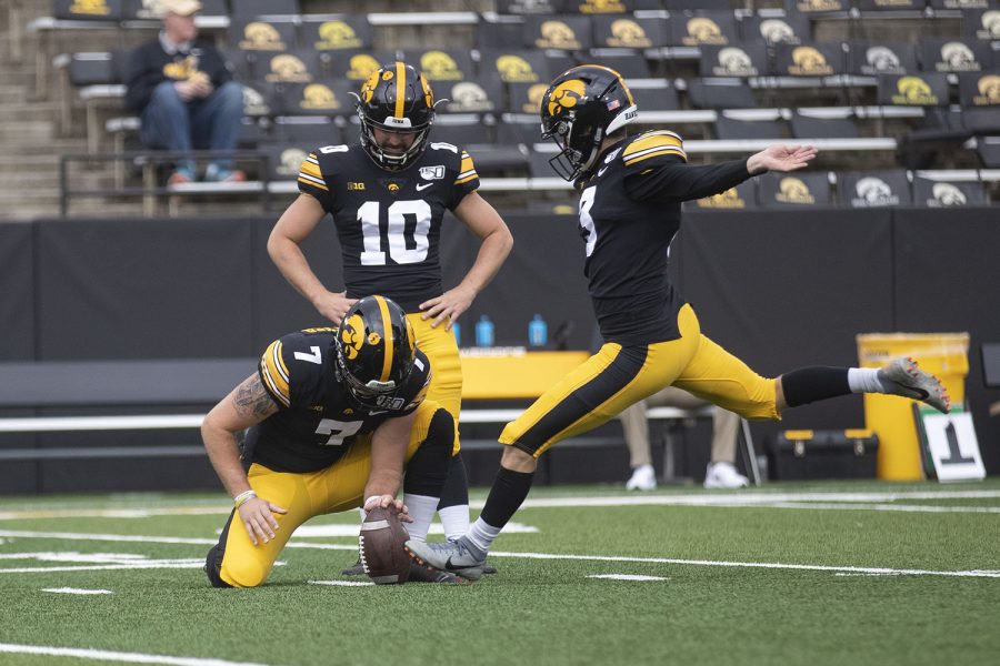 Iowa players warm up before the football game against Purdue at Kinnick Stadium on Saturday, Oct. 19, 2019. (Jenna Galligan/The Daily Iowan)