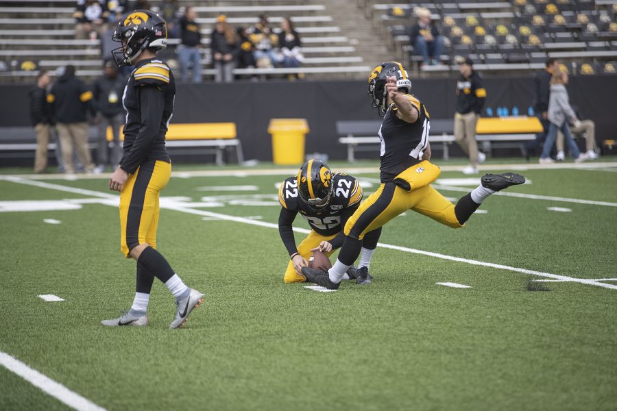 Iowa players warm up before the football game against Purdue at Kinnick Stadium on Saturday, Oct. 19, 2019. (Jenna Galligan/The Daily Iowan)