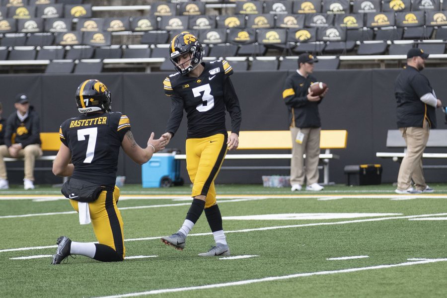 Iowa players warm up before the football game against Purdue at Kinnick Stadium on Saturday, Oct. 19, 2019. (Jenna Galligan/The Daily Iowan)