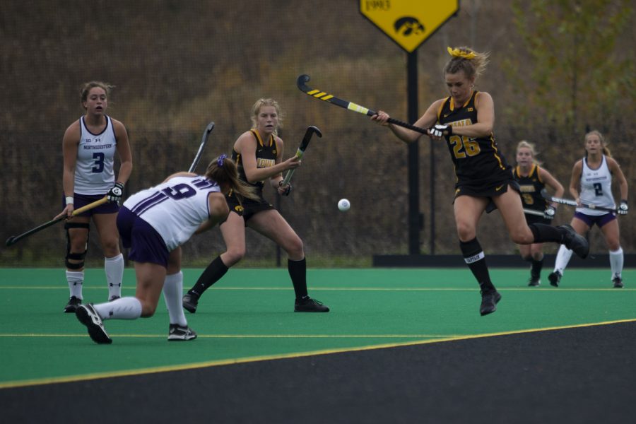 Iowa forward Maddy Murphy jumps to block a pass during a field hockey game between Iowa and Northwestern at Grant Field on Saturday Oct. 26, 2019. The Hawkeyes defeated the Wildcats 2-1.