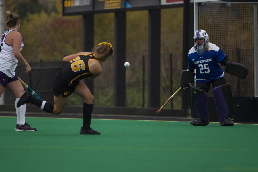Iowa forward Maddy Murphy shoots toward the goal, scoring the winning point of the field hockey game between Iowa and Northwestern at Grant Field on Saturday Oct. 26, 2019. The Hawkeyes defeated the Wildcats 2-1.