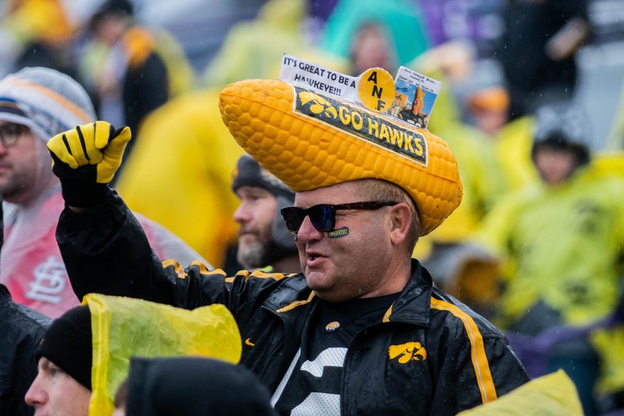 An Iowa fan cheers during a game against Northwestern at Ryan Field on Saturday, October 26, 2019. The Hawkeyes defeated the Wildcats 20-0. 