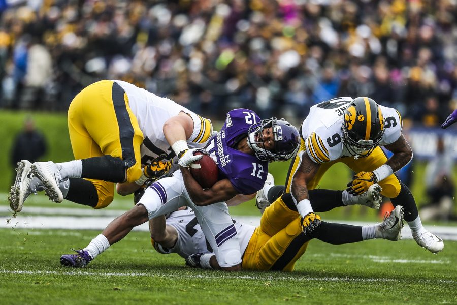 Northwestern wide receiver JJ Jefferson breaks through Iowa players during the Iowa vs. Northwestern football game at Ryan Field on Saturday, October 26, 2019. The Hawkeyes defeated the Wildcats 20-0. Jefferson caught two passes and gained a total of 23 yards.