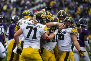 Iowa players celebrate during the Iowa vs. Northwestern football game at Ryan Field on Saturday, October 26, 2019. The Hawkeyes defeated the Wildcats 20-0. 