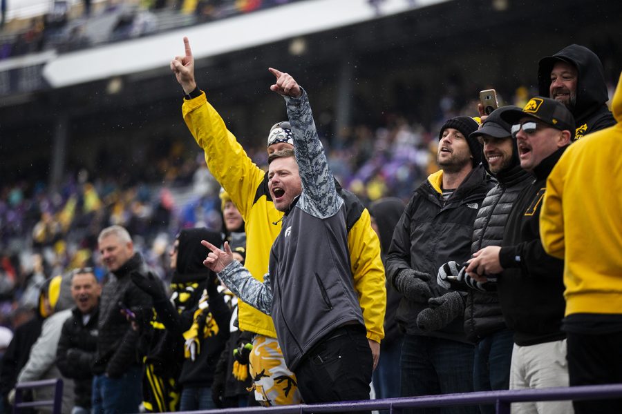 Iowa fans celebrate the win during the Iowa vs. Northwestern football game at Ryan Field on Saturday, October 26, 2019. The Hawkeyes defeated the Wildcats 20-0.