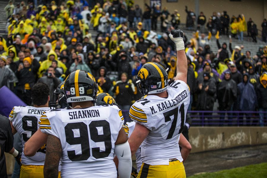 Iowa players celebrate the win during the Iowa vs. Northwestern football game at Ryan Field on Saturday, October 26, 2019. The Hawkeyes defeated the Wildcats 20-0.
