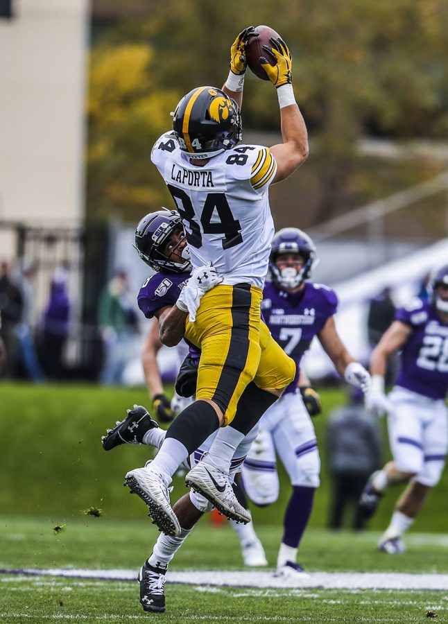 Iowa tight end Sam LaPorta reaches for a pass during the Iowa vs. Northwestern football game at Ryan Field on Saturday, October 26, 2019. The Hawkeyes defeated the Wildcats 20-0. The pass was later ruled incomplete.