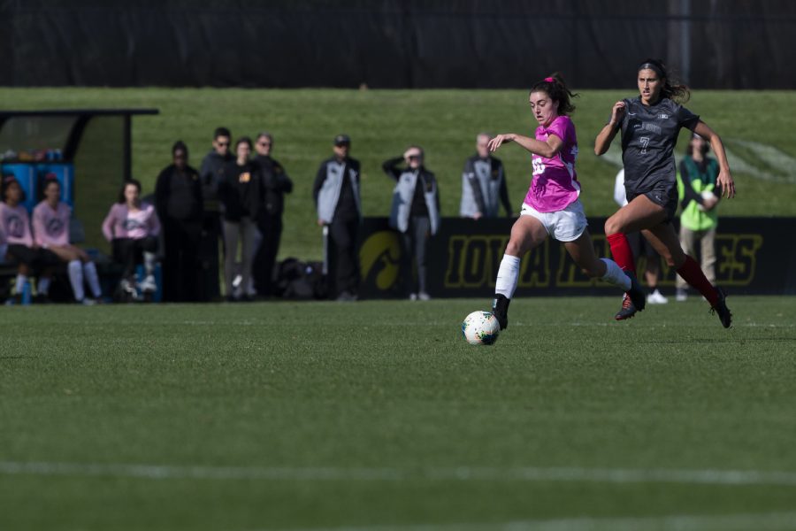 Ohio State midfielder Alyssa Baumbick chases down Iowa forward Adrianna Naumoski during a soccer game between Iowa and Ohio State at the Iowa Soccer Complex on Sunday Oct. 27, 2019. The Hawkeyes defeated the Badgers 2-1. 