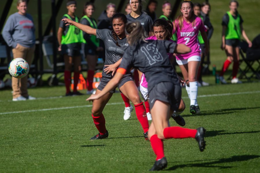 Iowa forward Emma Tokuyama tries to get around Ohio State defender Kitty Jones-Black during the Iowa versus Ohio State game at the University of Iowa Soccer Complex on Sunday, October 27, 2019. The Hawkeyes defeated the Buckeyes 2-1 in double overtime. 