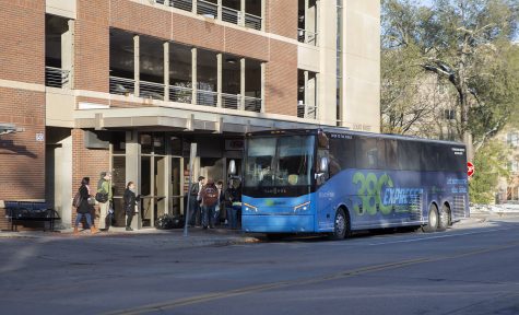 A 380 Express bus pulls into the Court Street Transportation Center on Thursday, Oct. 31, 2019. The bus service, which is managed by the East Central Iowa Council of Governments, stops at each stop every 30 minutes during peak times, and every 60 minutes throughout the mid-day. 