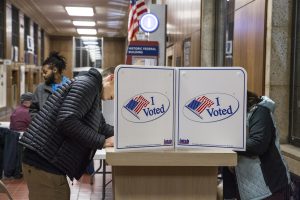 Voters fill out their ballots at a polling location in the Historic Dubuque Federal Building in Dubuque on Tuesday Nov. 6, 2018.