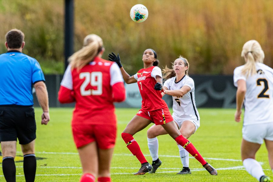 Iowa defender Riley Whitaker and Maryland forward Alyssa Poarch fight for the ball during a womens soccer match between Iowa and Maryland at the Iowa Soccer Complex on Sunday, October 13, 2019. The Hawkeyes shut out the Terrapins, 4-0. 