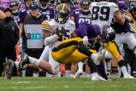Iowa running back Tyler Goodson completes a carry during a game against Northwestern at Ryan Field on Saturday, October 26, 2019. The Hawkeyes defeated the Wildcats 20-0. 