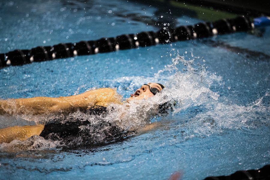 UI swimmer Emelia Sansome competes during the triangle meet against Michigan State and UNI on Thursday, October 3, 2019. 