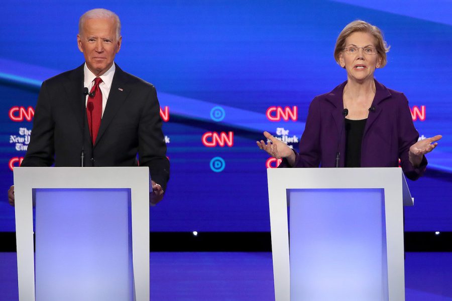 Former Vice President Joe Biden and Sen. Elizabeth Warren (D-Mass.) during the Democratic Presidential Debate at Otterbein University on Tuesday, Oct. 15, 2019, in Westerville, Ohio. (Win McNamee/Getty Images/TNS)