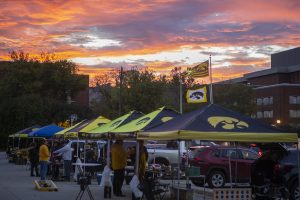 Hawkeye fans gather in the Main Library parking lot for tailgate festivities before the Iowa vs. Purdue game at sunrise on Saturday, October 19th, 2019. Iowa was ranking 23rd in the AP Collegiate Football Ranking poll.