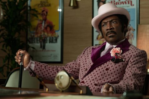Eddie Murphy stars as Rudy Ray Moore, a struggling performer who strikes it big with a larger-than-life persona in "Dolemite is My Name." [Netflix]