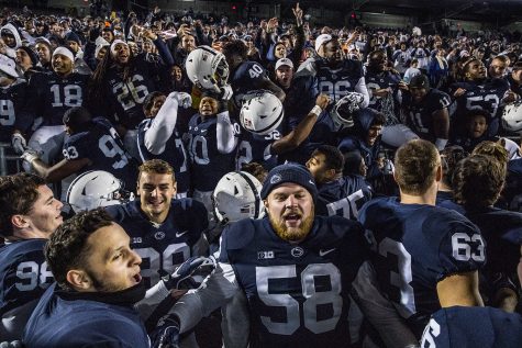 Penn State players celebrate in front of the student section  after Iowas game against Penn State at Beaver Stadium on Saturday, October 27, 2018. The Nittany Lions defeated the Hawkeyes 30-24.