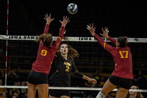 Iowa setter Courtney Buzzerio goes for a kill during a volleyball match between Iowa and Iowa State at Carver-Hawkeye Arena on Saturday, September 21, 2019. The Hawkeyes fell to the visiting Cyclones, 3-2. 