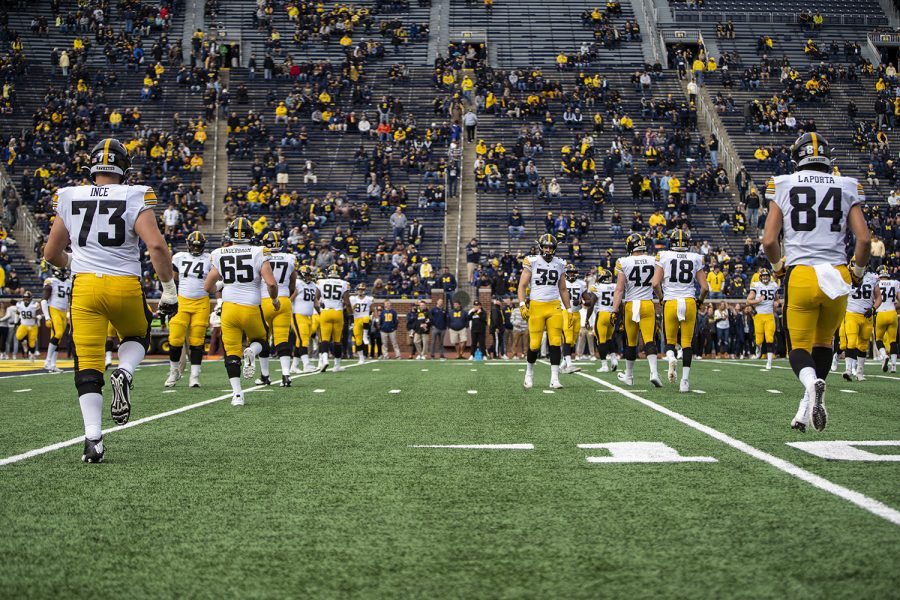 Iowa players warm up before a football game between Iowa and Michigan in Ann Arbor on Saturday, October 5, 2019.