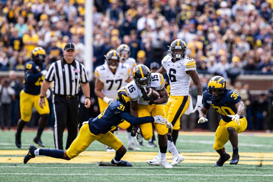 Iowa running back Tyler Goodson carries the ball during a football game between Iowa and Michigan in Ann Arbor on Saturday, October 5, 2019. 