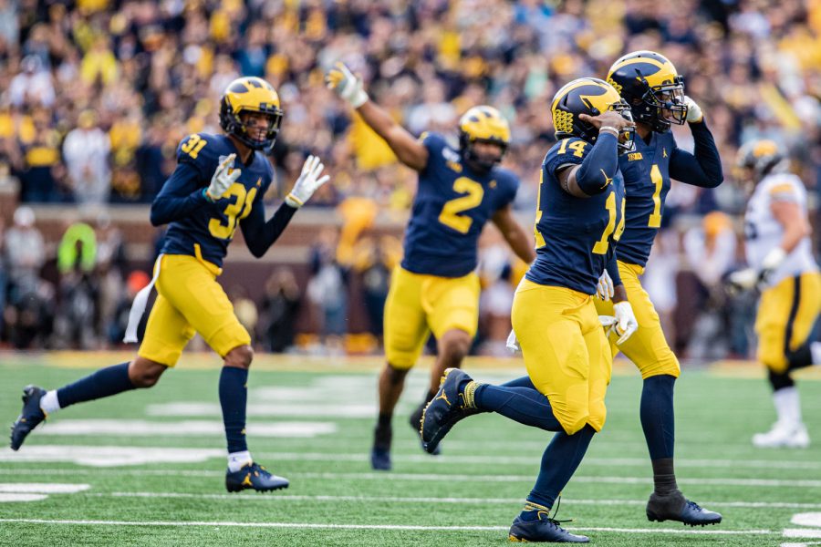 Michgans Josh Metellus celebrates intercepting an Iowa pass during a football game between Iowa and Michigan in Ann Arbor on Saturday, October 5, 2019. The Wolverines celebrated homecoming and defeated the Hawkeyes, 10-3.