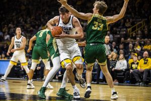 Iowa center Luka Garza drives the ball during the mens basketball game against Cal Poly at Carver-Hawkeye Arena on Sunday, November 24, 2019. The Hawkeyes defeated the Mustangs 85-59. Garza made 8 of his 13 baskets.
